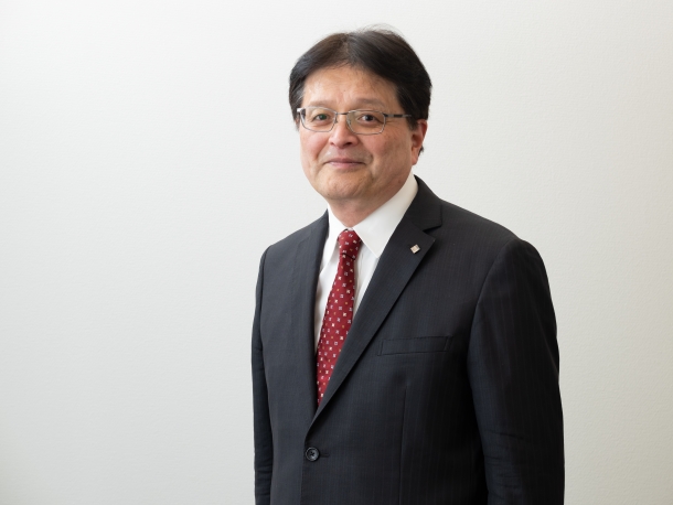 弦間 正彦