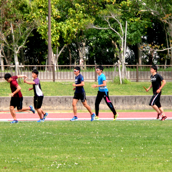 Baton passing practice is essential to Kuki, who also runs in relays