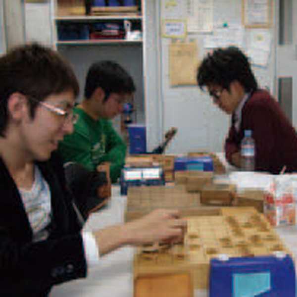 In addition to playing against other members in the club room, the members research shogi problems and standard shogi moves each day.