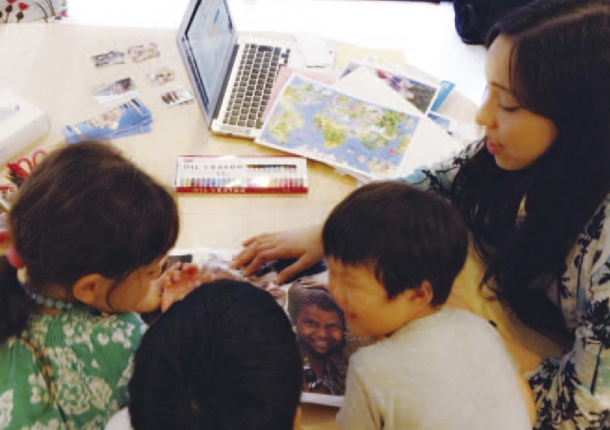 Iwazawa (right) interacting with some of her children