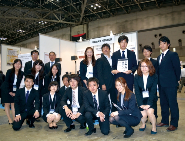 Students are happy to display their completed robot at an international exhibition!