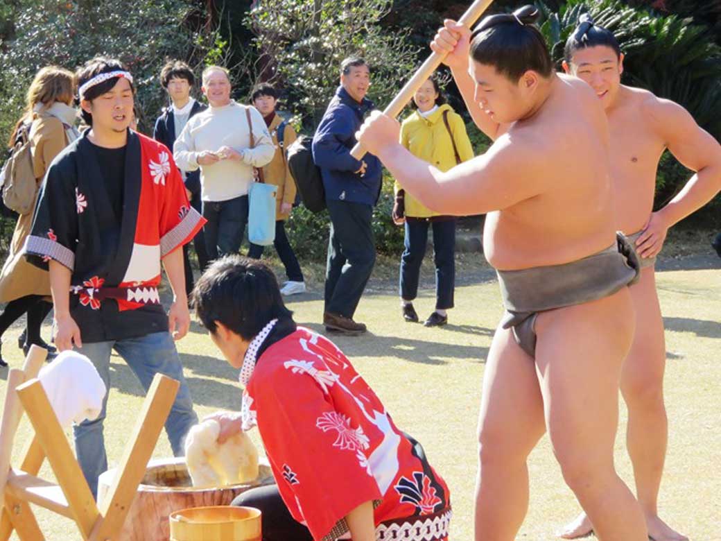 Sumo wrestlers join students at annual mochi pounding gathering